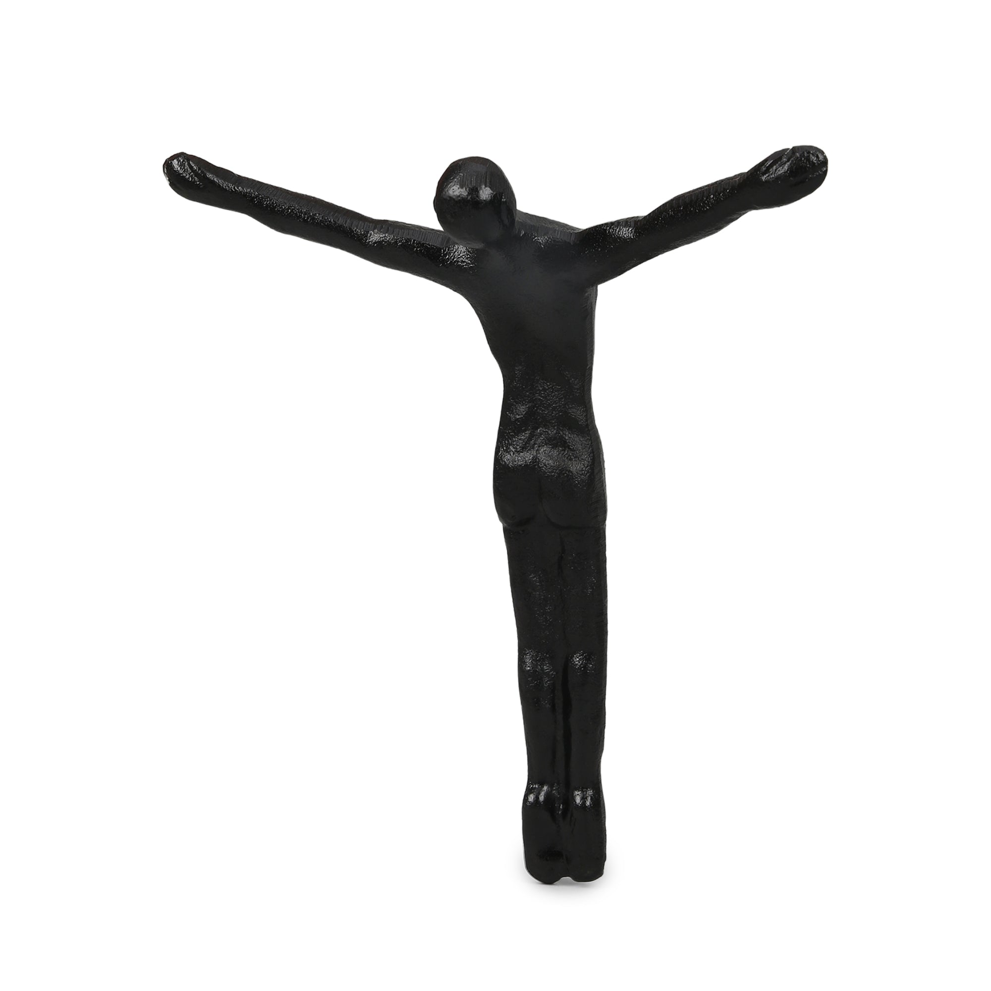 Black sculpture of a figure with outstretched arms on a white background