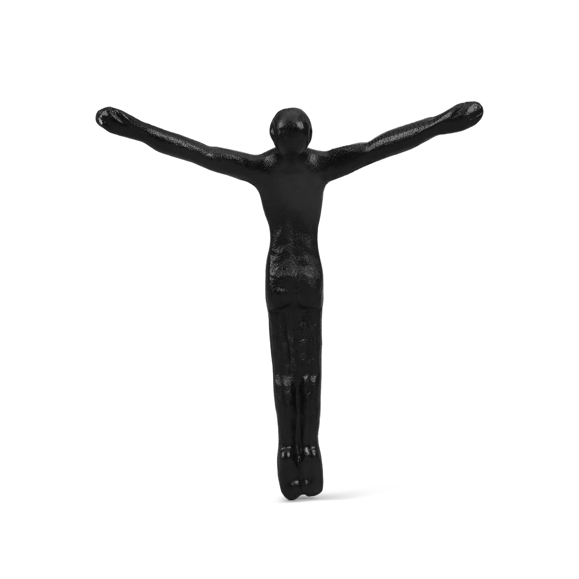 Black sculpture of a figure with outstretched arms on a white background