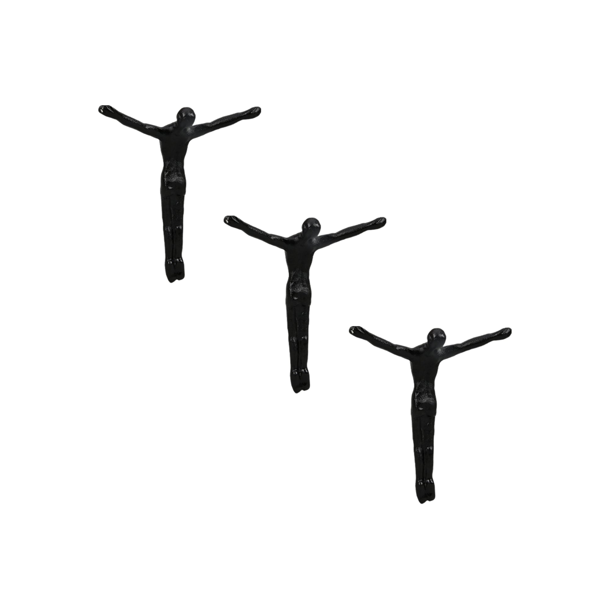 Three black abstract figure sculptures on a white background