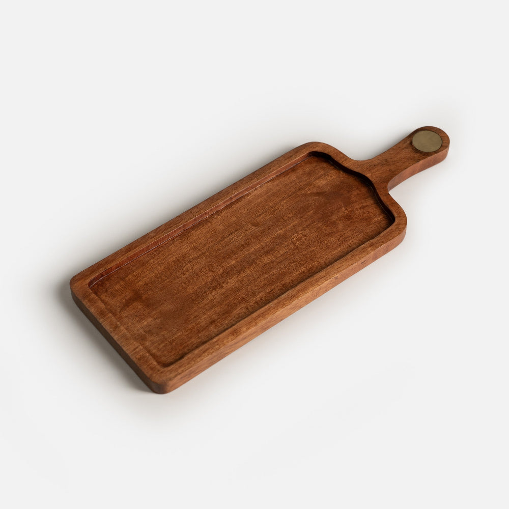 Wooden serving board with handle on a white background