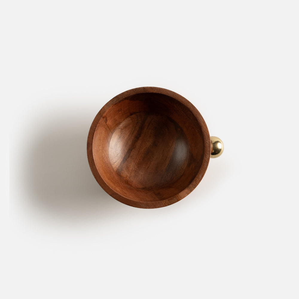 Wooden bowl with a gold accent on a white background