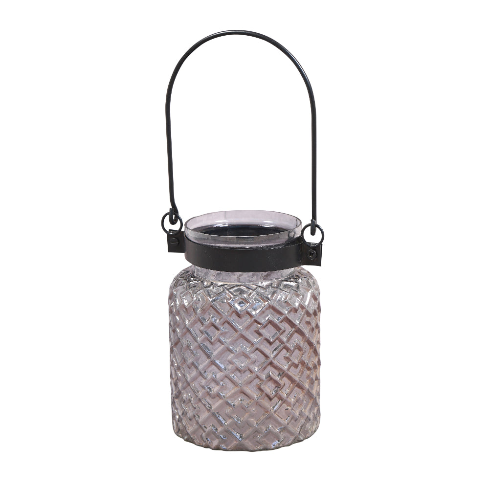 Decorative glass lantern with a black handle on a white background