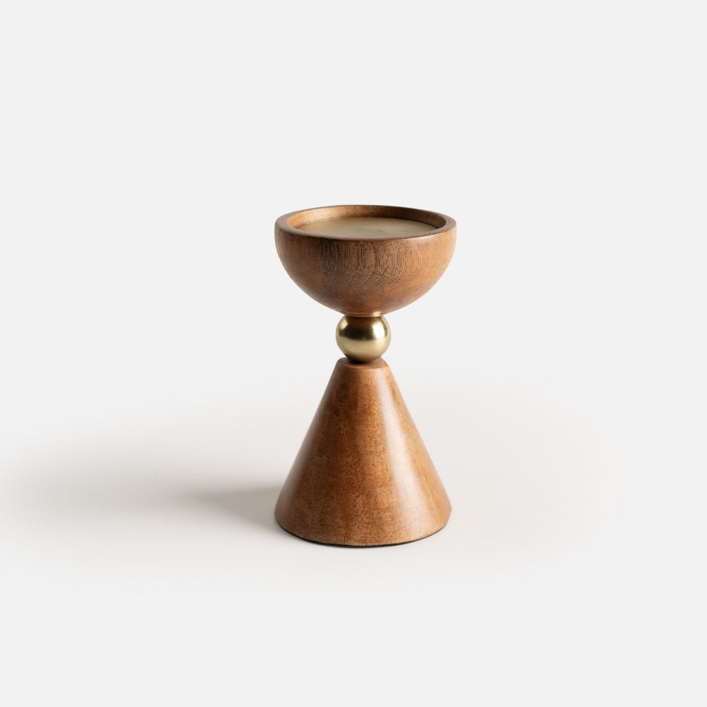 Wooden candle holder with gold accent on a white background