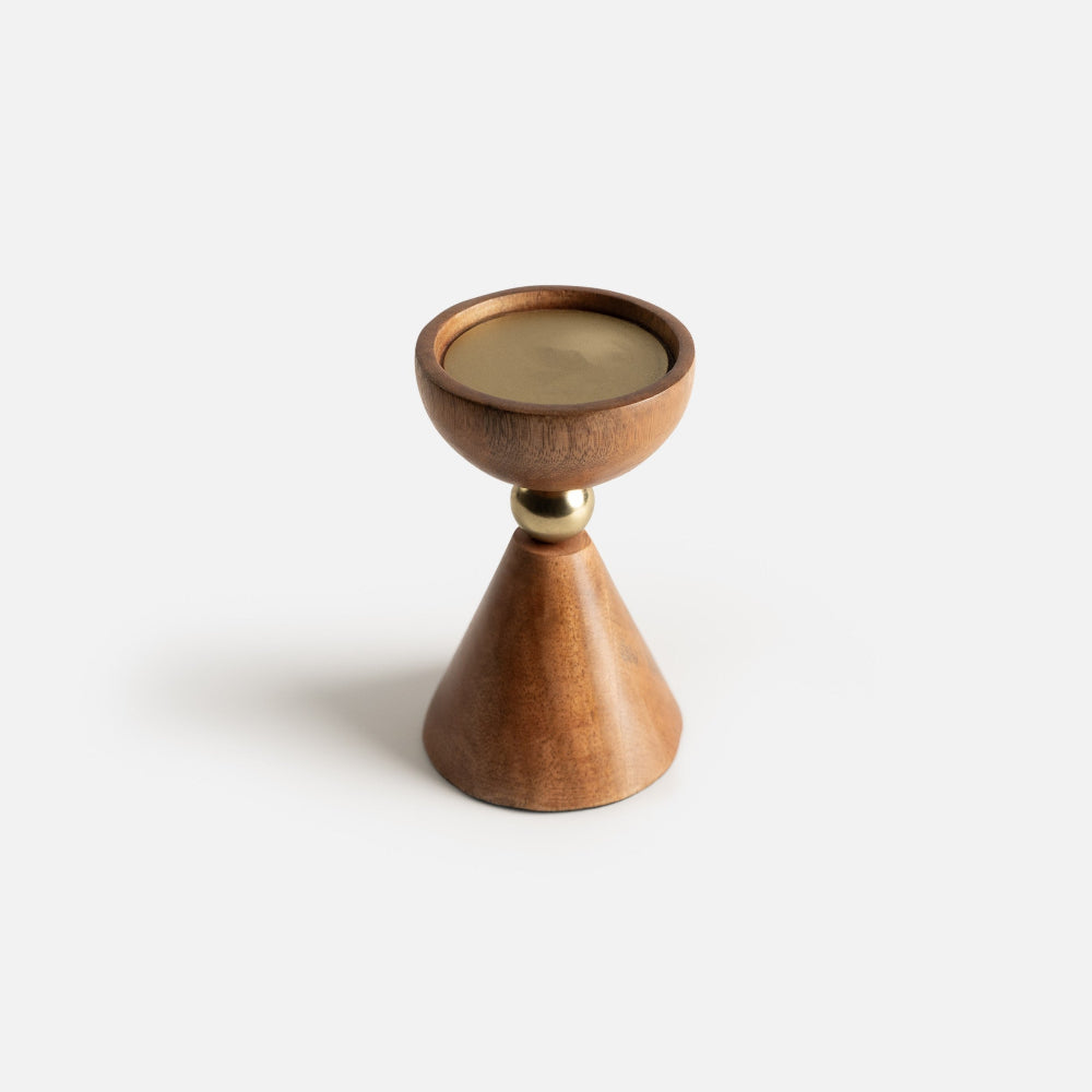 Wooden candle holder with a gold accent on a white background