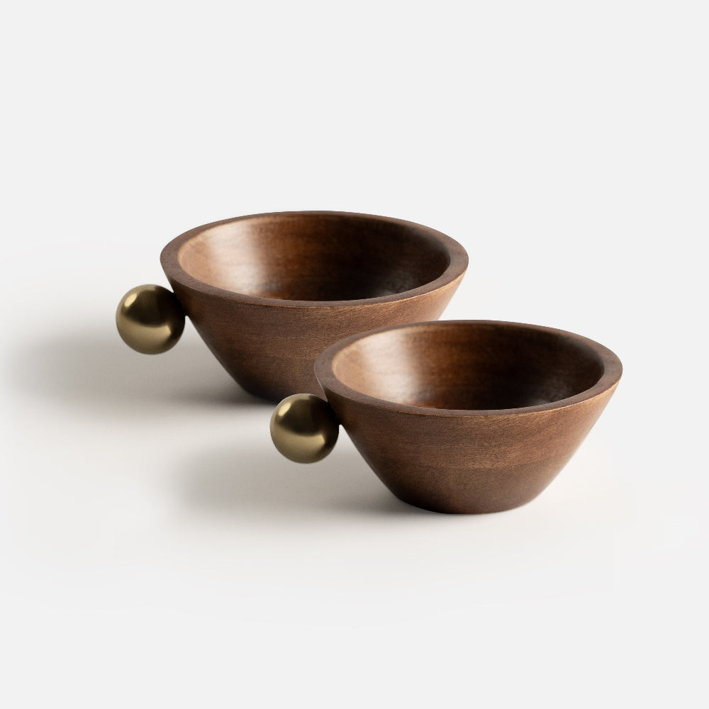 Two wooden bowls with spherical handles on a white background
